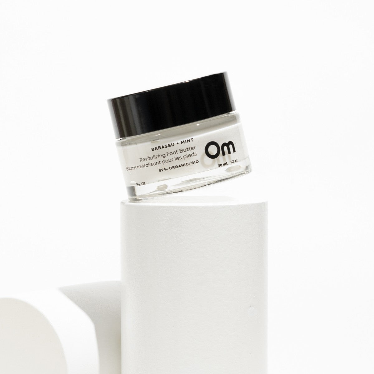 Om Organics Babassu + Mint Revitalizing Foot Butter with a refreshing mint, cucumber, and eucalyptus scent. Lightweight, nourishing formula for soft, moisturized feet.