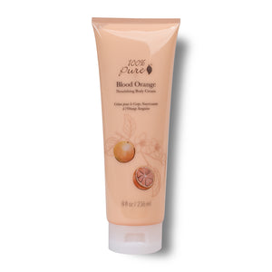 A tube of 100% Pure Blood Orange Nourishing Body Cream on a white background. The tube is a soft peach-pink color with illustrations of an orange and a sliced orange on the front, and a white cap at the bottom.