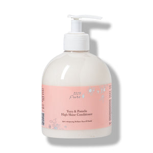 Bottle of Yuzu & Pomelo High Shine Conditioner with a pump on a white background