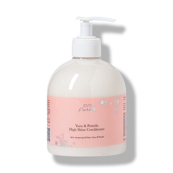 Bottle of Yuzu & Pomelo High Shine Conditioner with a pump on a white background