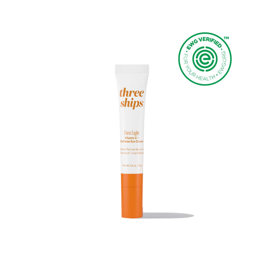 THREE SHIPS First Light Vitamin C + Caffeine Eye Cream, featuring a cooling ceramic tip and key ingredients like Acerola Cherry Vitamin C and upcycled Coffee Seed Oil for under-eye hydration and radiance.