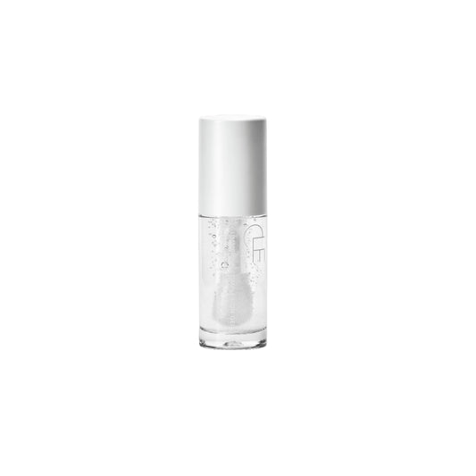 CLE Cosmetics Glimmering Complexion Gel with a clear jelly texture, subtle shimmer, and oil-based formula for a radiant, glass-skin finish. Features carrot seed oil and beta-carotene for a nourishing glow.