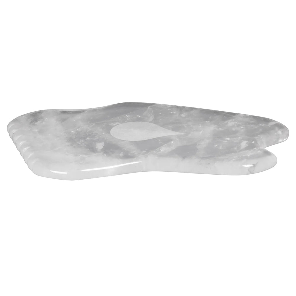 Living Libations Classic Quartz Gua Sha stone with gentle curves for facial and body massage.