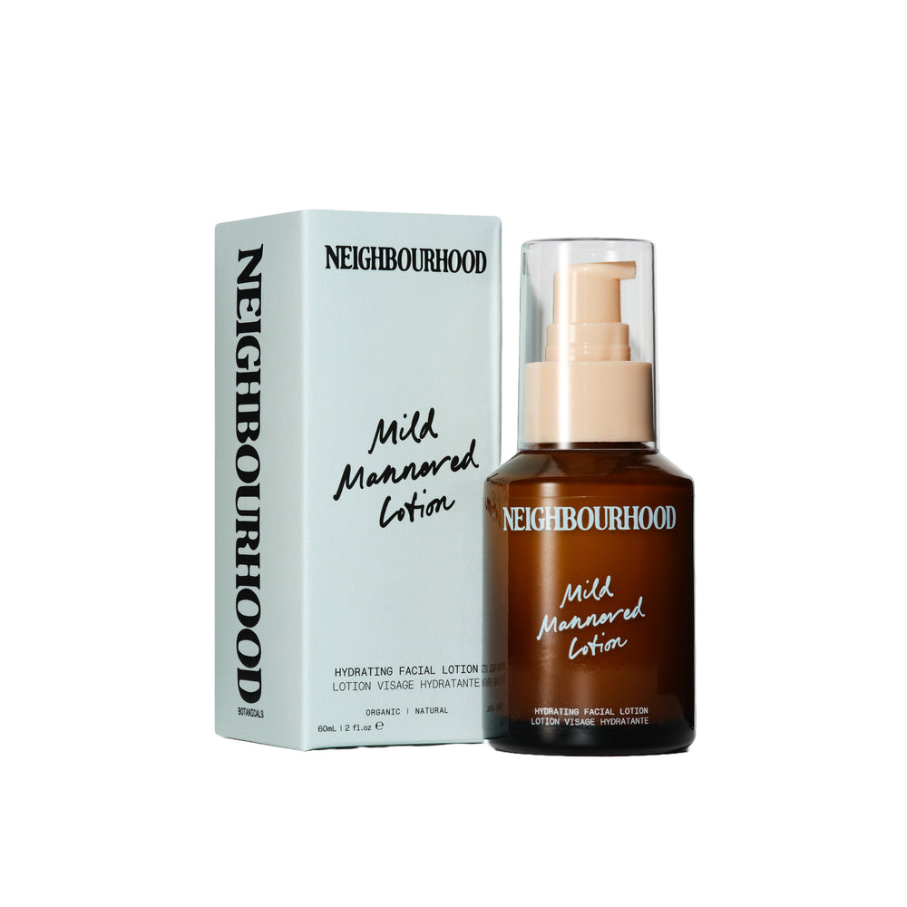 Neighbourhood Botanicals Mild Mannered Hydrating Facial Lotion in an amber glass bottle with pump. A lightweight, nourishing moisturizer for soft, comfortable skin.
