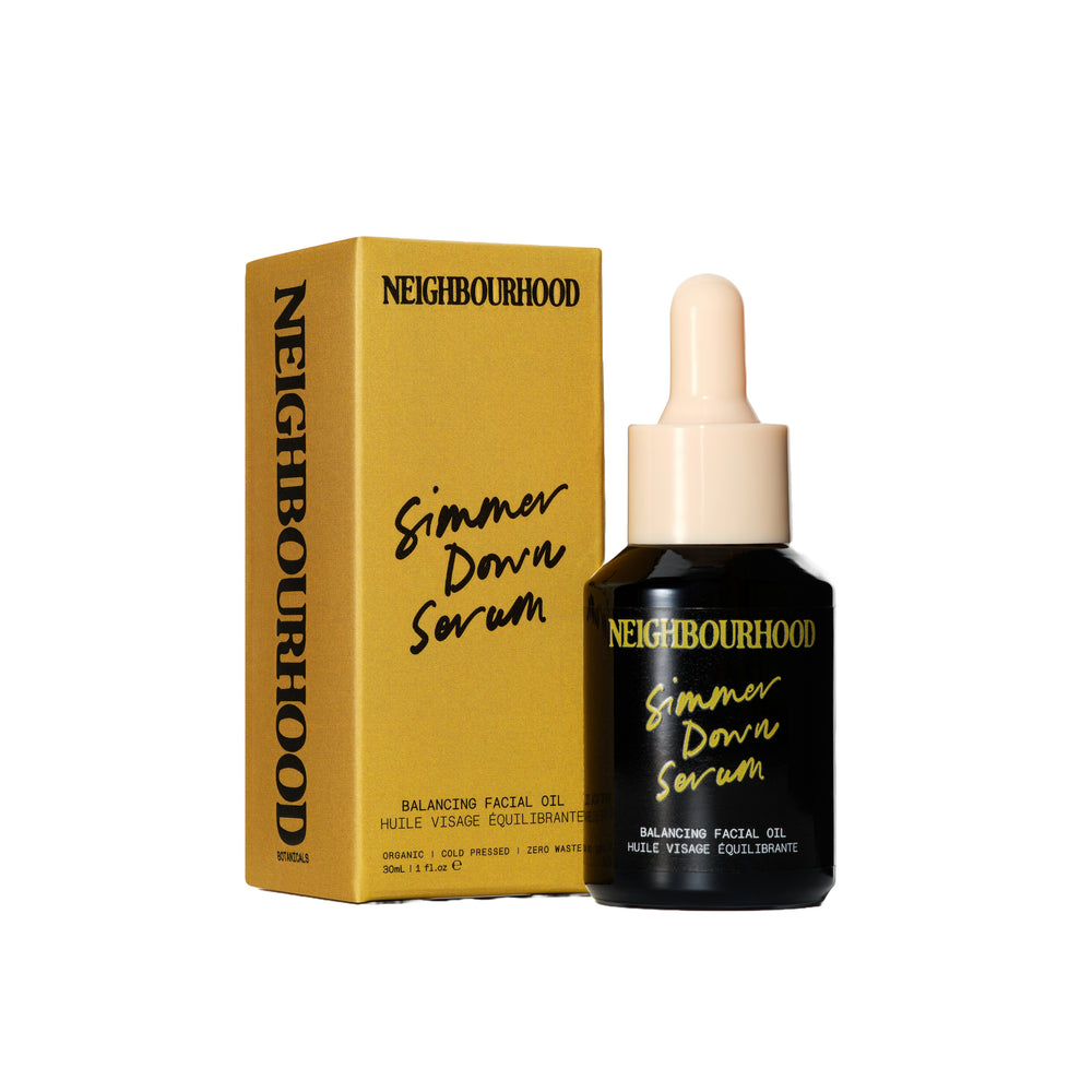 Neighbourhood Botanicals Simmer Down Serum – lightweight balancing facial oil in a 30ml amber glass bottle with pipette.