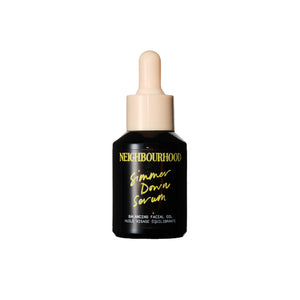 Neighbourhood Botanicals Simmer Down Serum – lightweight balancing facial oil in a 30ml amber glass bottle with pipette.