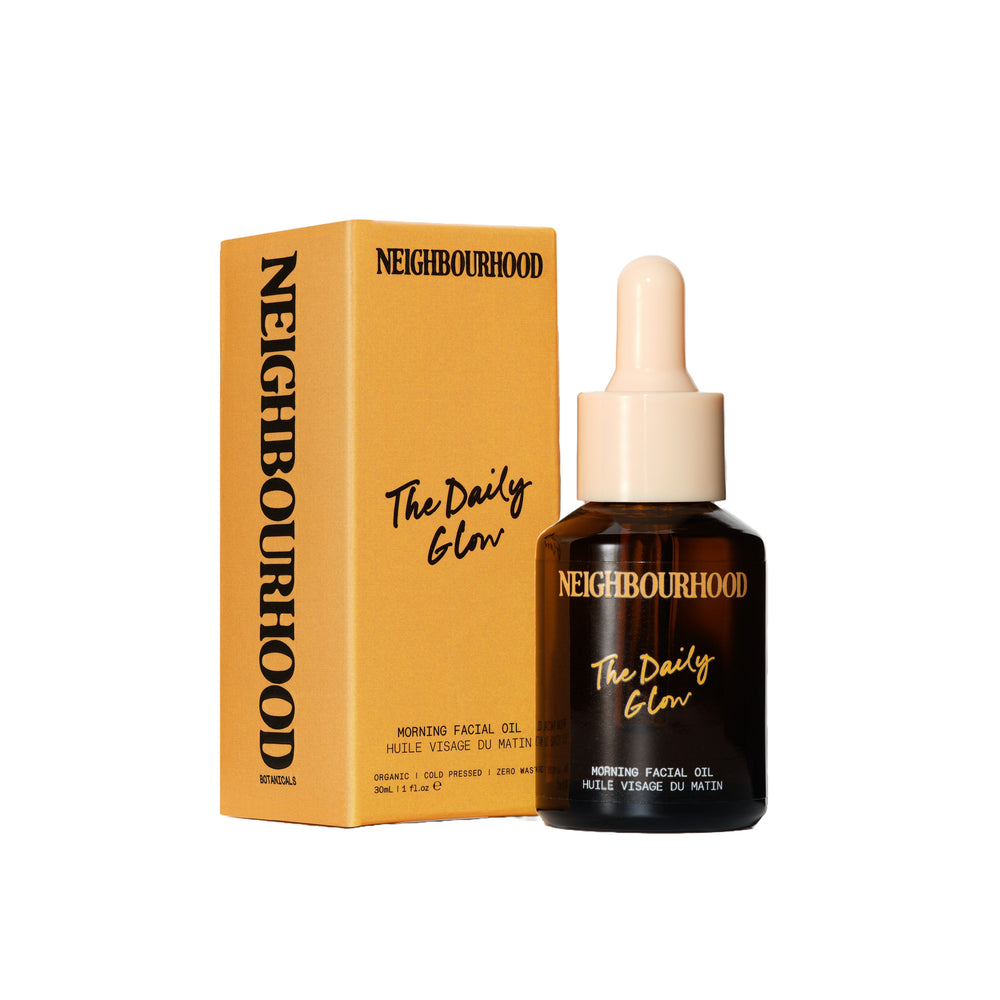 Neighbourhood Botanicals The Daily Glow Morning Facial Oil in a 30ml amber glass bottle with pipette, formulated with cold-pressed botanical oils for a fresh, radiant complexion.