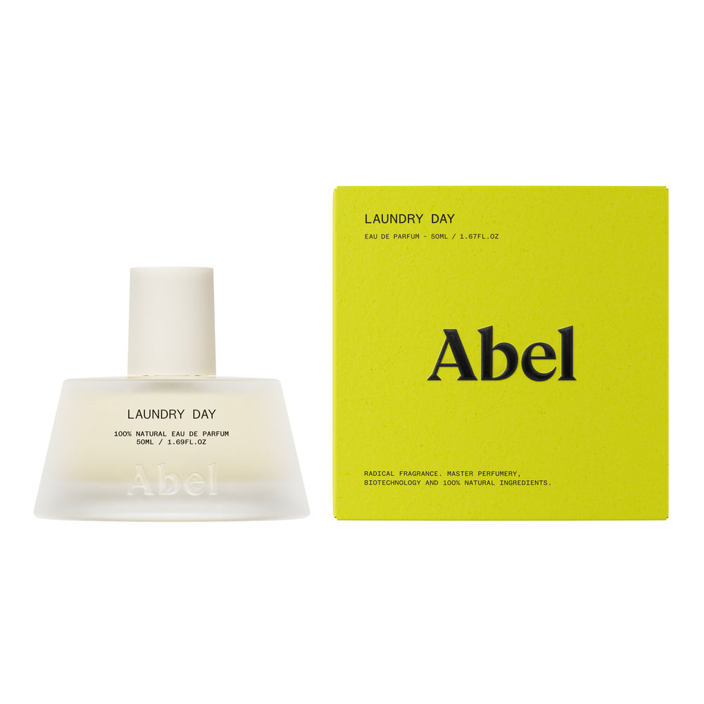 A frosted glass bottle of Abel Laundry Day 100% Natural Eau de Parfum, 50ml, featuring a matte off-white cap and black text on a clean white background.