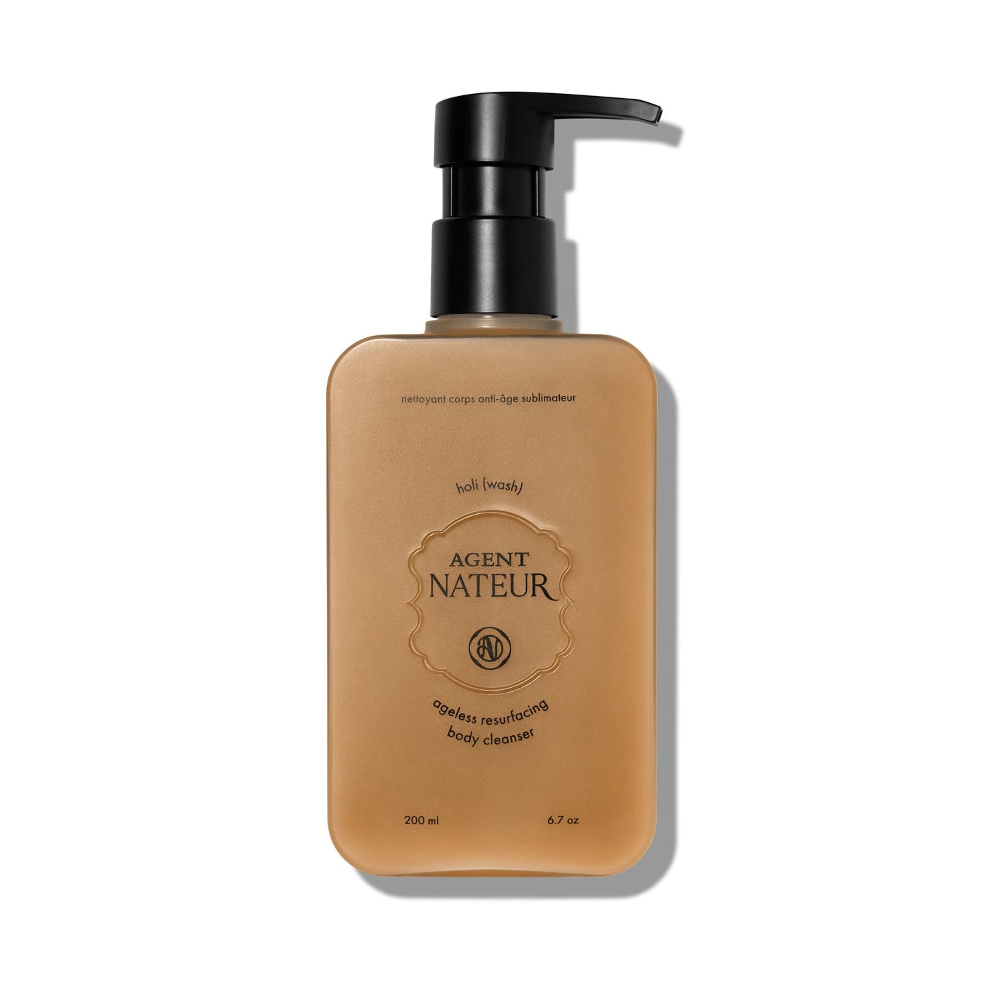 Agent Nateur holi (wash) Ageless Resurfacing Body Cleanser in sleek bottle, a foaming oil body wash with lactic acid, peony extract, and nourishing oils for radiant skin.