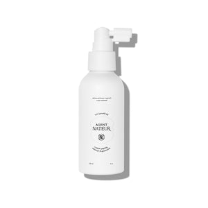 AGENT NATEUR holi (growth) 84 leave-in scalp spray in a sleek white bottle, designed to nourish the scalp and enhance the look of hair density.
