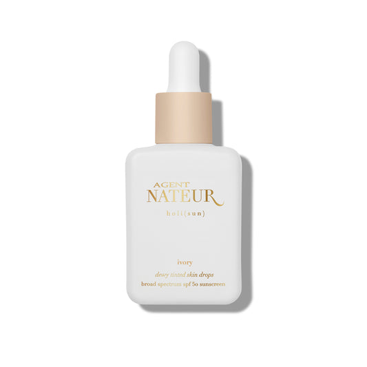 AGENT NATEUR holi (sun) Dewy Tinted Skin Drops - SPF 50 mineral skin drops with non-nano zinc oxide. ivory