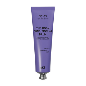 A lavender purple squeeze tube of AKT London The Body Conditioning Balm (SC.03 the Onsen) with a silver metal cap, centered on a light off-white background with a soft shadow.