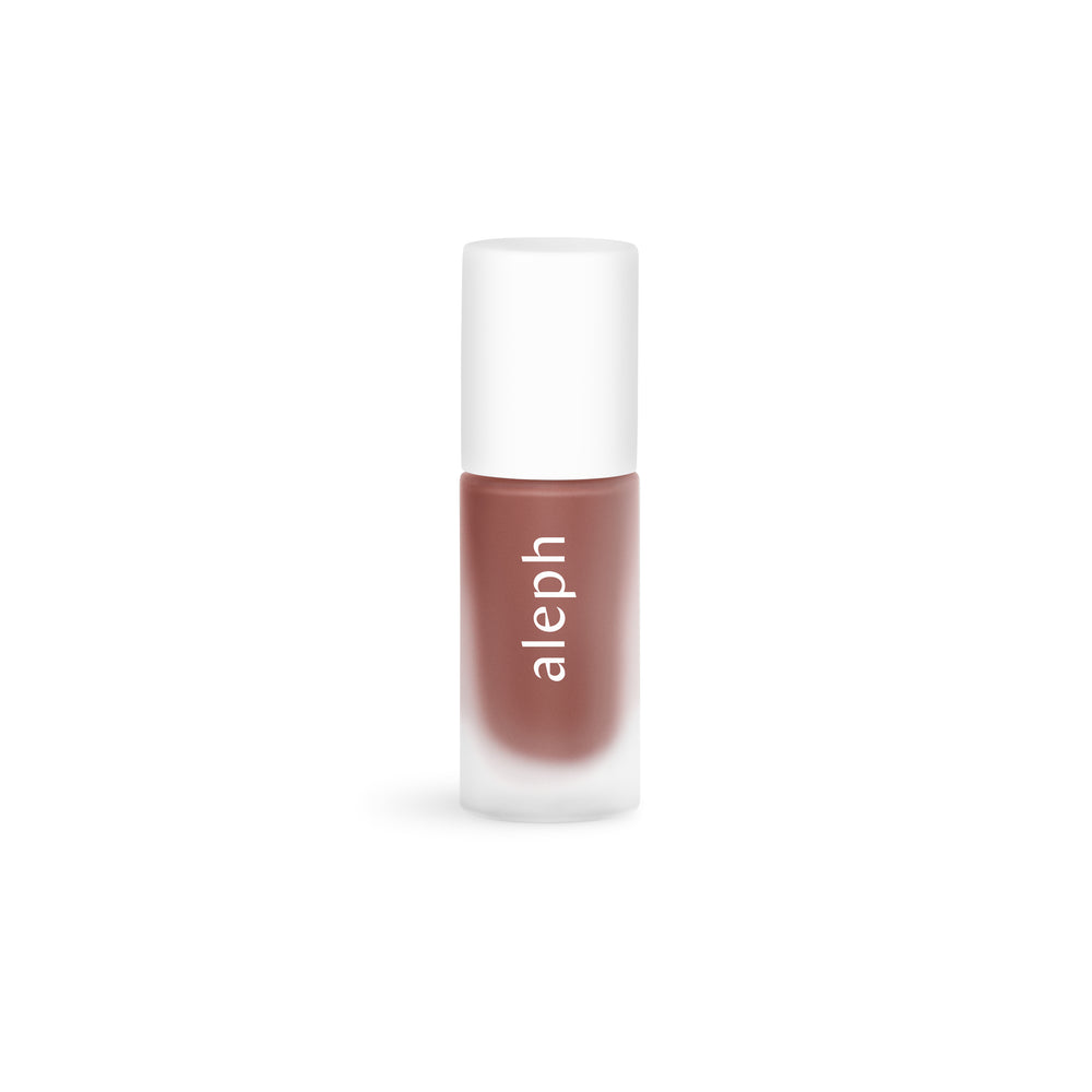 Lip gloss with 'aleph' branding on a white background