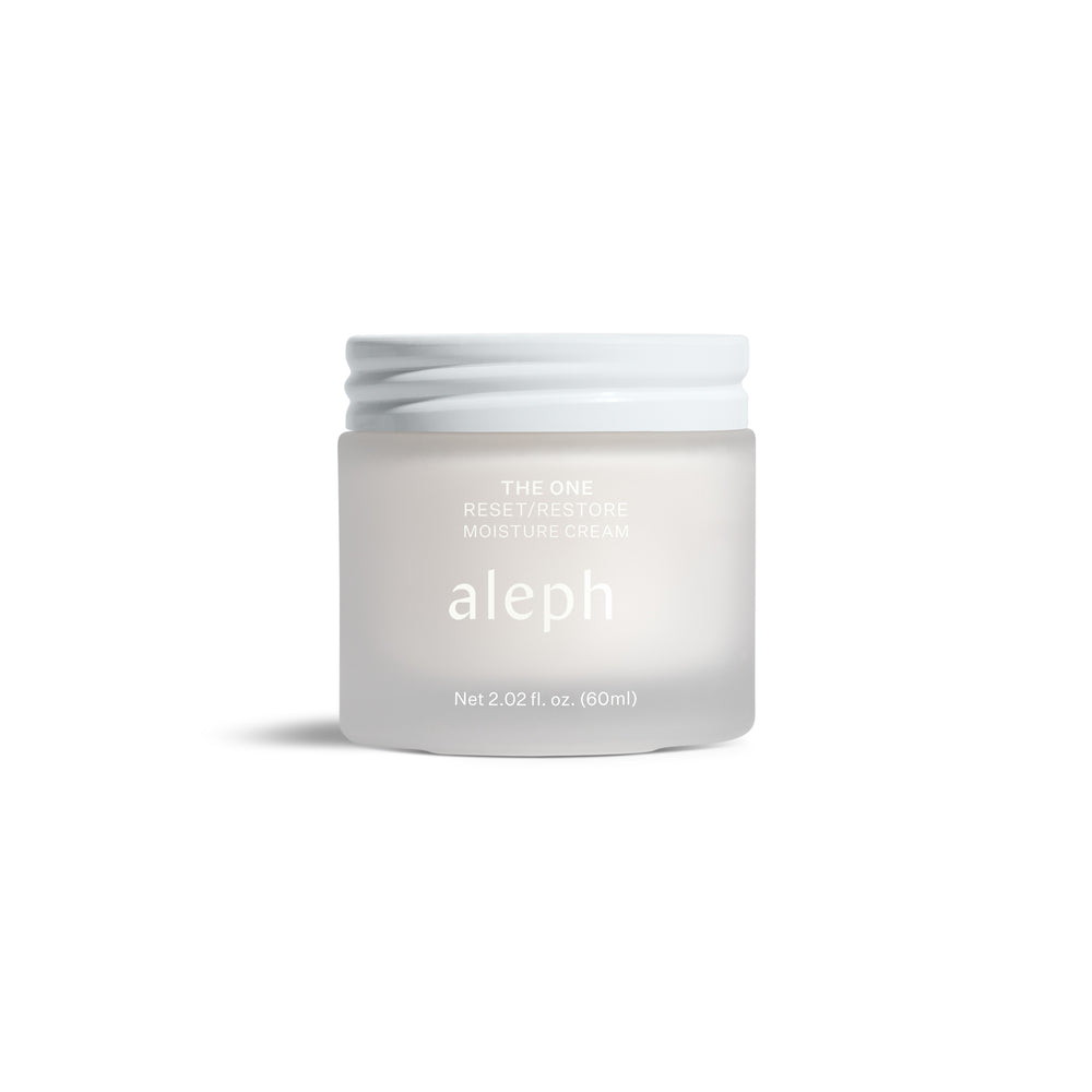 Aleph The One Reset and Restore Moisture Cream in a sleek glass jar, a versatile moisturizer for hydrated, radiant skin.