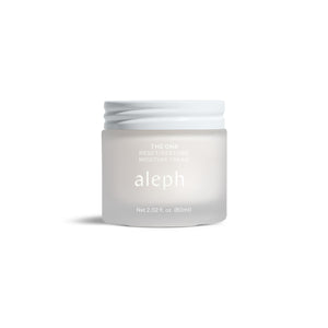 Aleph The One Reset and Restore Moisture Cream in a sleek glass jar, a versatile moisturizer for hydrated, radiant skin.