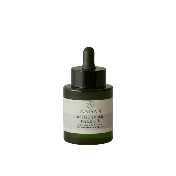 Angan Arctic Youth Face Oil in a dark green glass dropper bottle with a black dropper cap and a white label, centered on a plain white background.