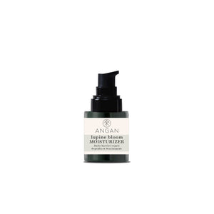A dark green glass bottle of ANGAN Lupine Bloom Moisturizer with black pump on white background