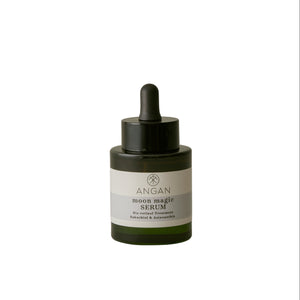 Angan Moon Magic Serum in a dark green glass dropper bottle with a black cap and a white label, centered on a plain white background.