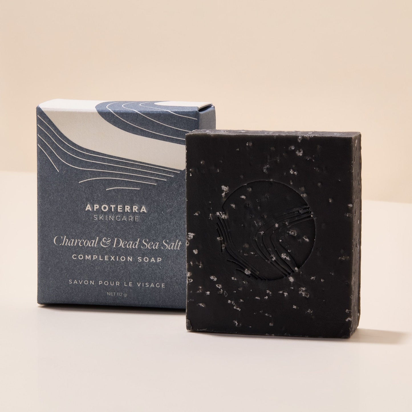 APOTERRA Charcoal and Dead Sea Salt Complexion Soap with activated charcoal, tea tree oil, and mineral-rich Dead Sea salt for a refreshing cleanse.