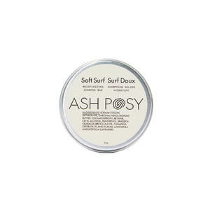 ASH POSY Soft Surf Moisturizing Shampoo Bar – solid shampoo bar with lightweight lathering formula, featuring broccoli seed oil and ylang-ylang, shown with eco-friendly tin.