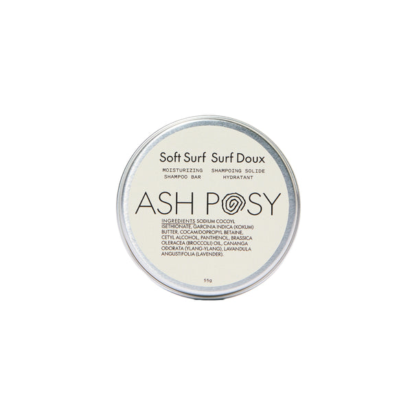 ASH POSY Soft Surf Moisturizing Shampoo Bar – solid shampoo bar with lightweight lathering formula, featuring broccoli seed oil and ylang-ylang, shown with eco-friendly tin.