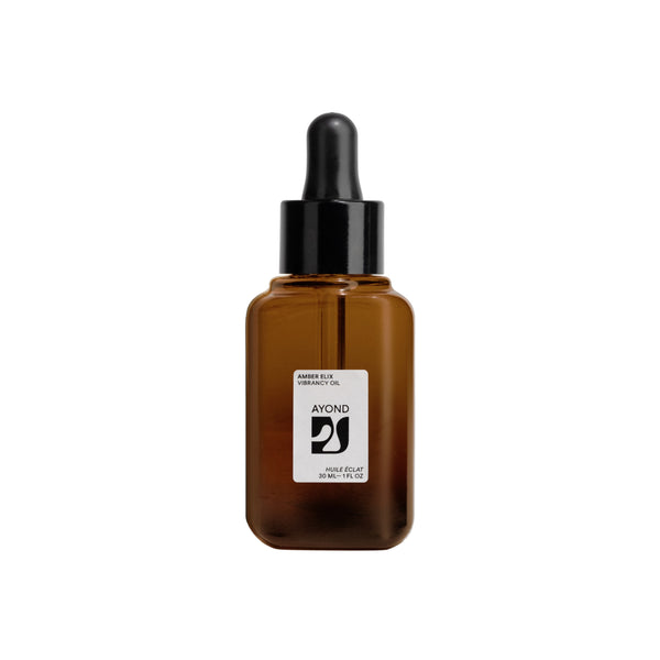 AYOND Amber Elix Vibrancy Oil in a 30 ml glass bottle against a neutral background, showcasing the elegant packaging of this advanced oil-serum elixir designed for enhancing skin radiance.