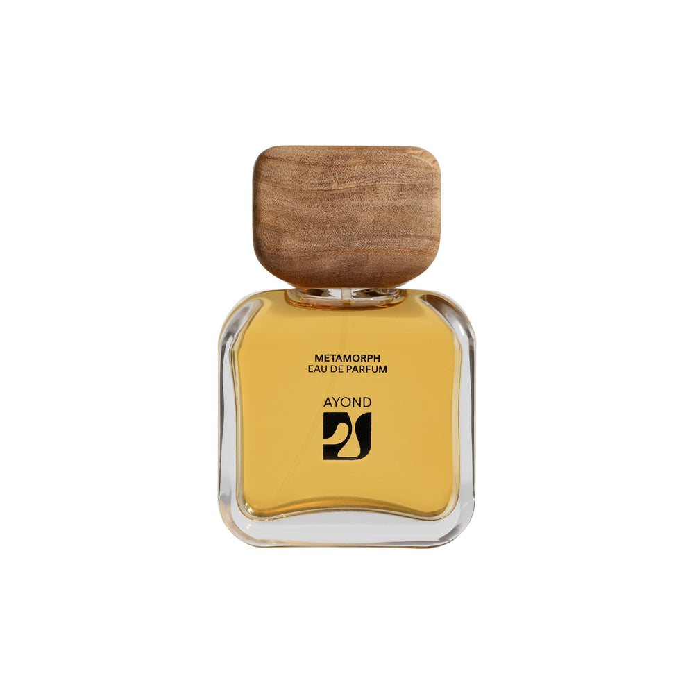 AYOND Metamorph perfume bottle with wooden cap on a white background