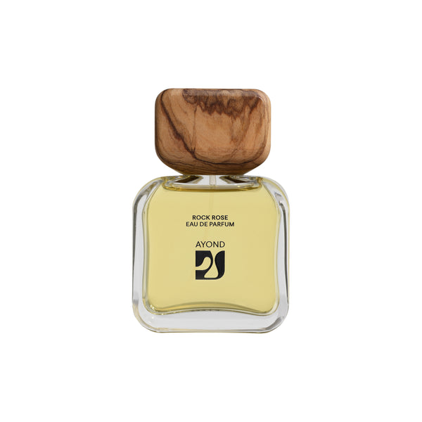 Perfume bottle with wooden cap from Ayond on a white background