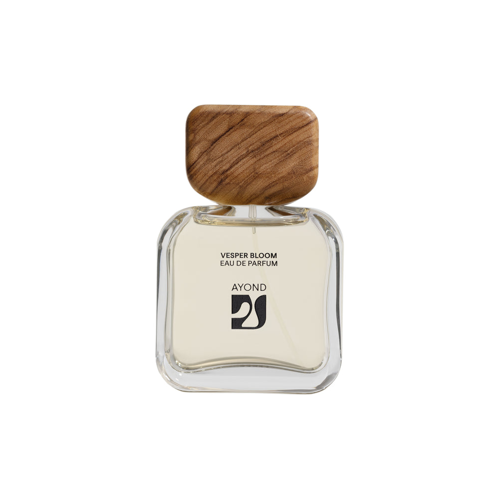 Vesper Bloom perfume bottle by Ayond with wooden cap on a white background