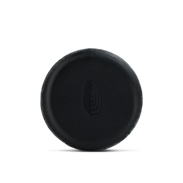 AYUNA Art of Shedding Bundle. Black charcoal detox soap on white background