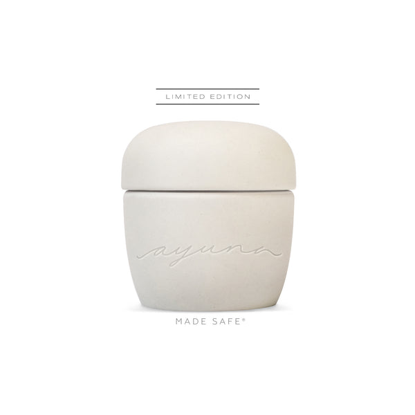 AYUNA Terra Eterna natural rejuvenating cream in a biodegradable ceramic jar with luxurious, rich, and melting texture.