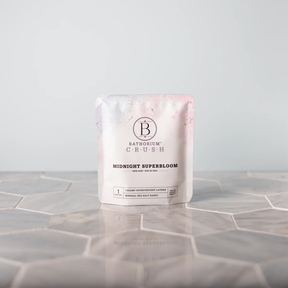 Bathorium Midnight Superbloom Crush bath soak with butterfly pea flower and floral essential oils. ALWAYS SHOW
