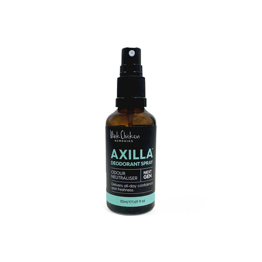 Black Chicken Remedies Axilla Natural Deodorant Spray in an amber glass bottle with black mist sprayer, shown as a natural deodorant spray formulated with botanical waters, essential oils, and zinc in a non aerosol format.