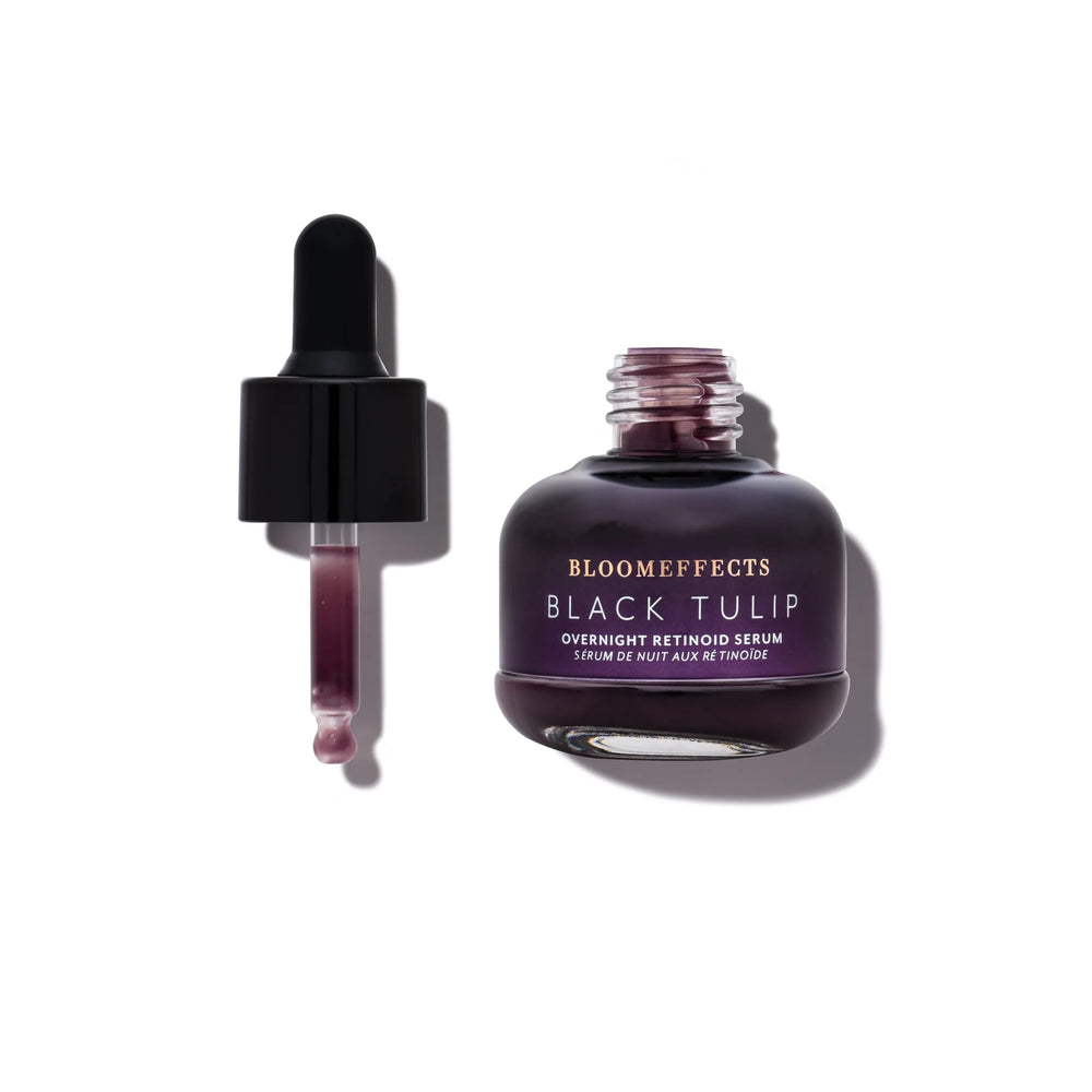BLOOMEFFECTS Black Tulip Overnight Retinoid Serum in dropper bottle, nourishing overnight facial serum for smooth and hydrated skin, on white background.