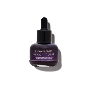 BLOOMEFFECTS Black Tulip Overnight Retinoid Serum in dropper bottle, nourishing overnight facial serum for smooth and hydrated skin, on white background.