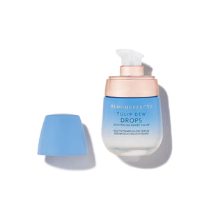 Skincare serum bottle labeled 'Bloomeffects Tulip Dew Drops' on a white background