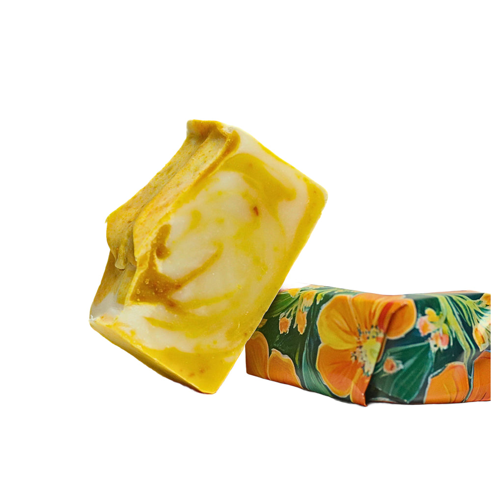 Blooming Wild Eunoia Soap bar featuring bright grapefruit and orange oils with nourishing shea butter, designed for a refreshing and softening citrus cleanse.
