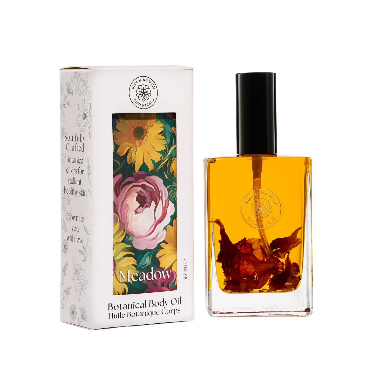 Blooming Wild Meadow Botanical Body Oil bottle filled with golden rosehip-infused oil, scented with ylang-ylang and grapefruit.