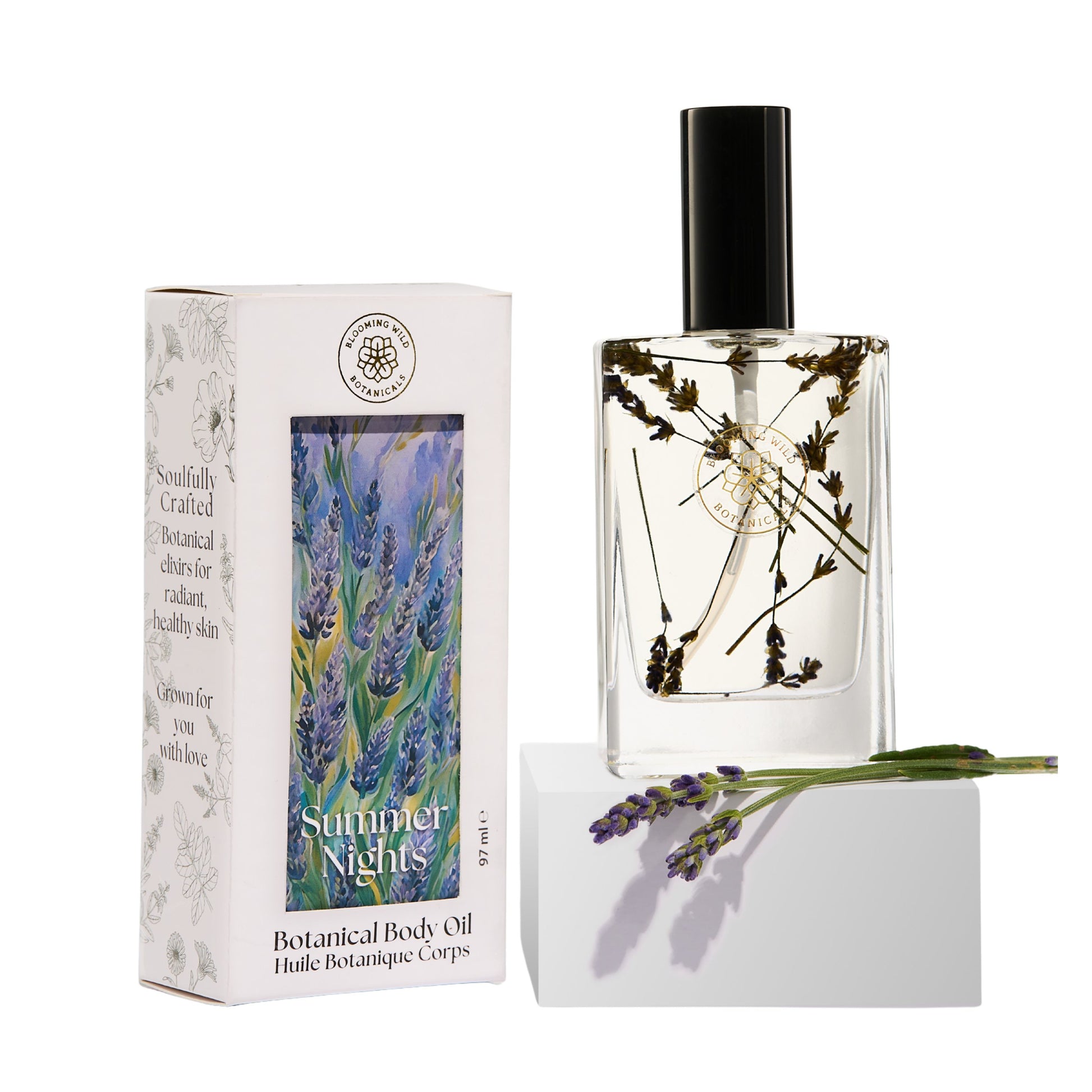 Blooming Wild Summer Nights Lavender Body Oil in a glass bottle, infused with farm-grown lavender for calming, soothing skin care.