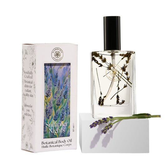 Blooming Wild Summer Nights Lavender Body Oil in a glass bottle, infused with farm-grown lavender for calming, soothing skin care.