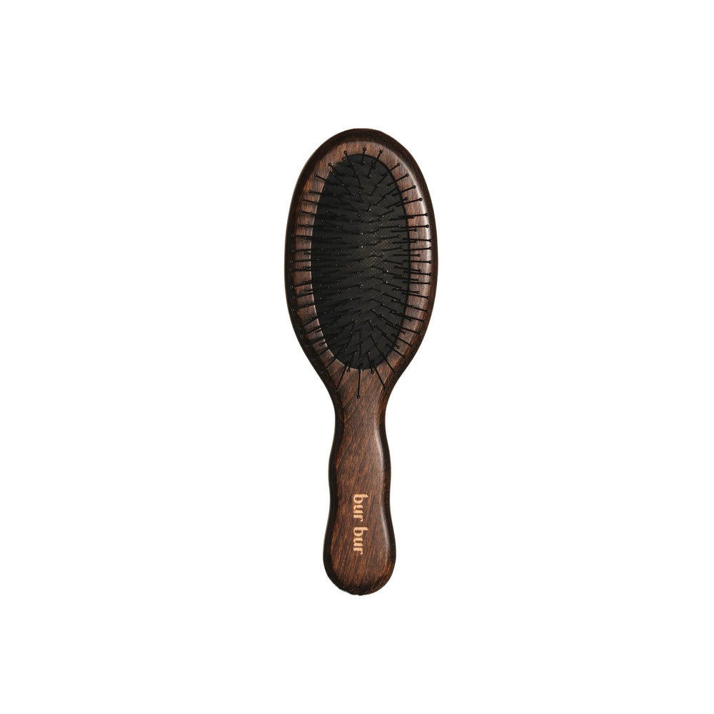Wooden hairbrush with black bristles from Bur Bur on a white background