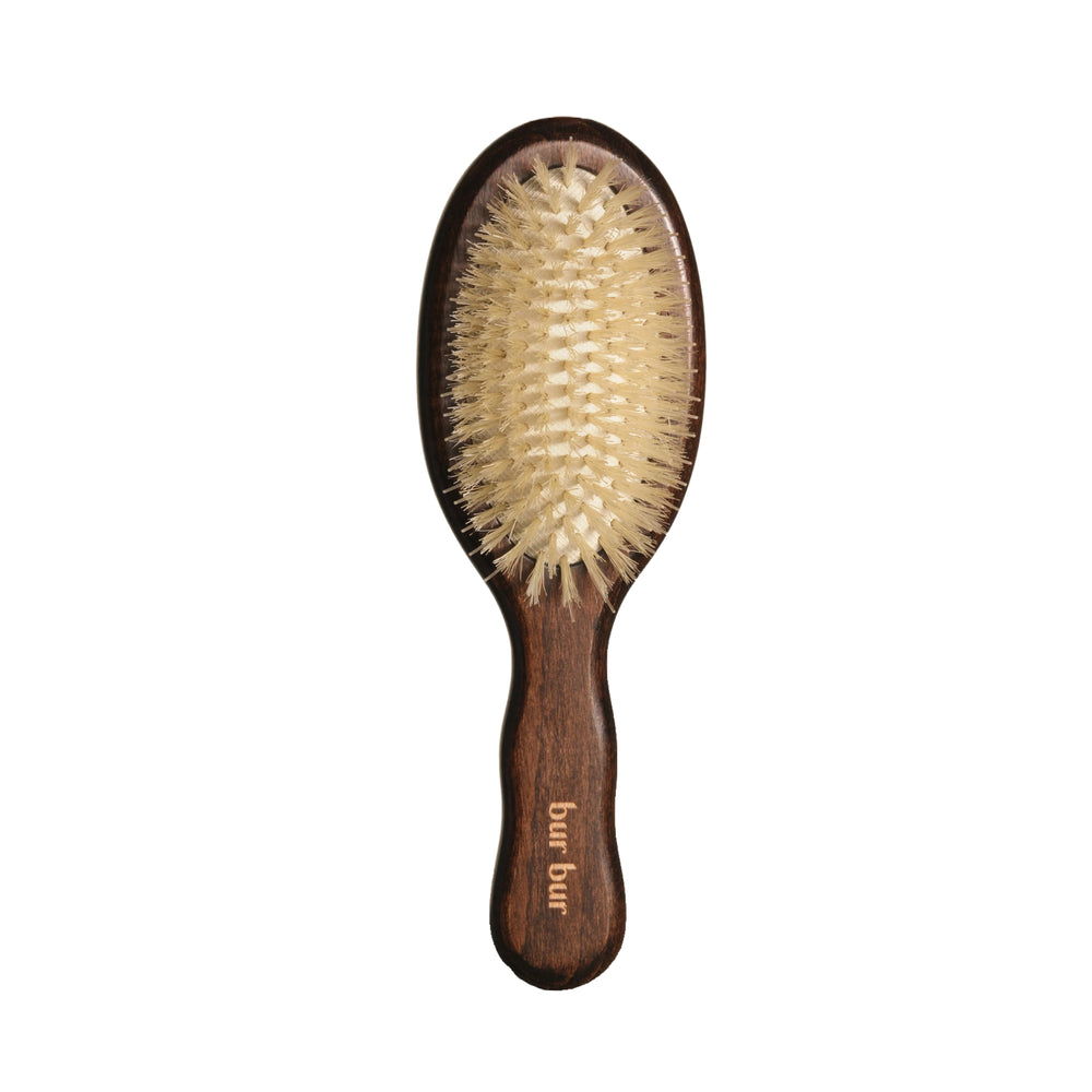 Wooden hairbrush with boar bristles from Bur Bur on a white background