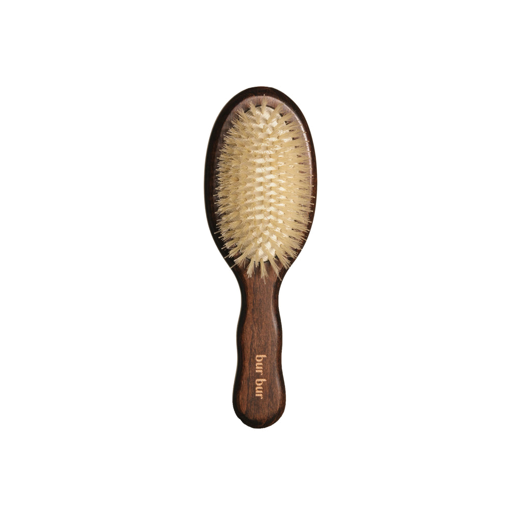 Wooden hairbrush with boar bristles from Bur Bur on a white background