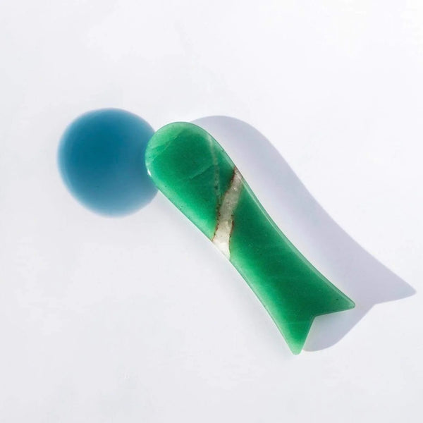 By Achilles Aventurine Gua Sha, a handcrafted natural stone tool for face contouring and soothing skincare rituals.
