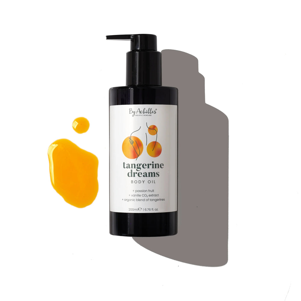 By Achilles Tangerine Dreams Body Oil, a nourishing blend of organic tangerines, vanilla CO₂ extract, and cold-pressed oils for hydrated, glowing skin.