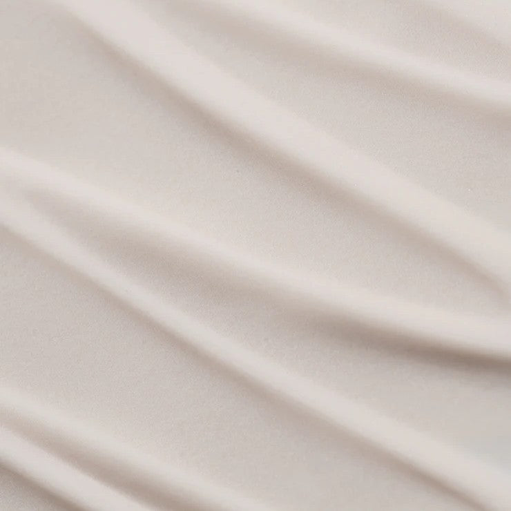 Bottle of COOLA Clear Skin Oil-Free Moisturizer SPF 30 with minimalist design, ideal for sensitive and blemish-prone skin.