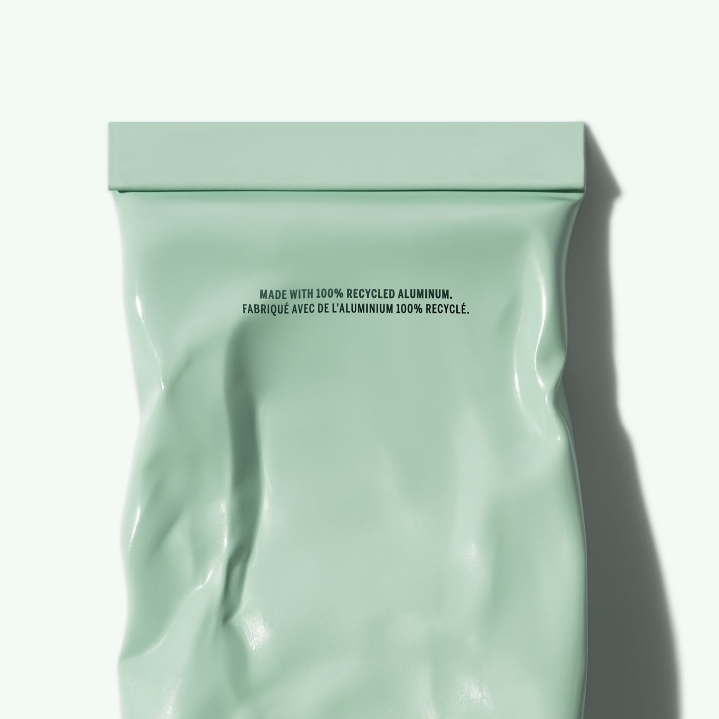 Green packaging with recycled aluminum text on a white background. CORPUS Aromatic Hand Cream Amalgam 7