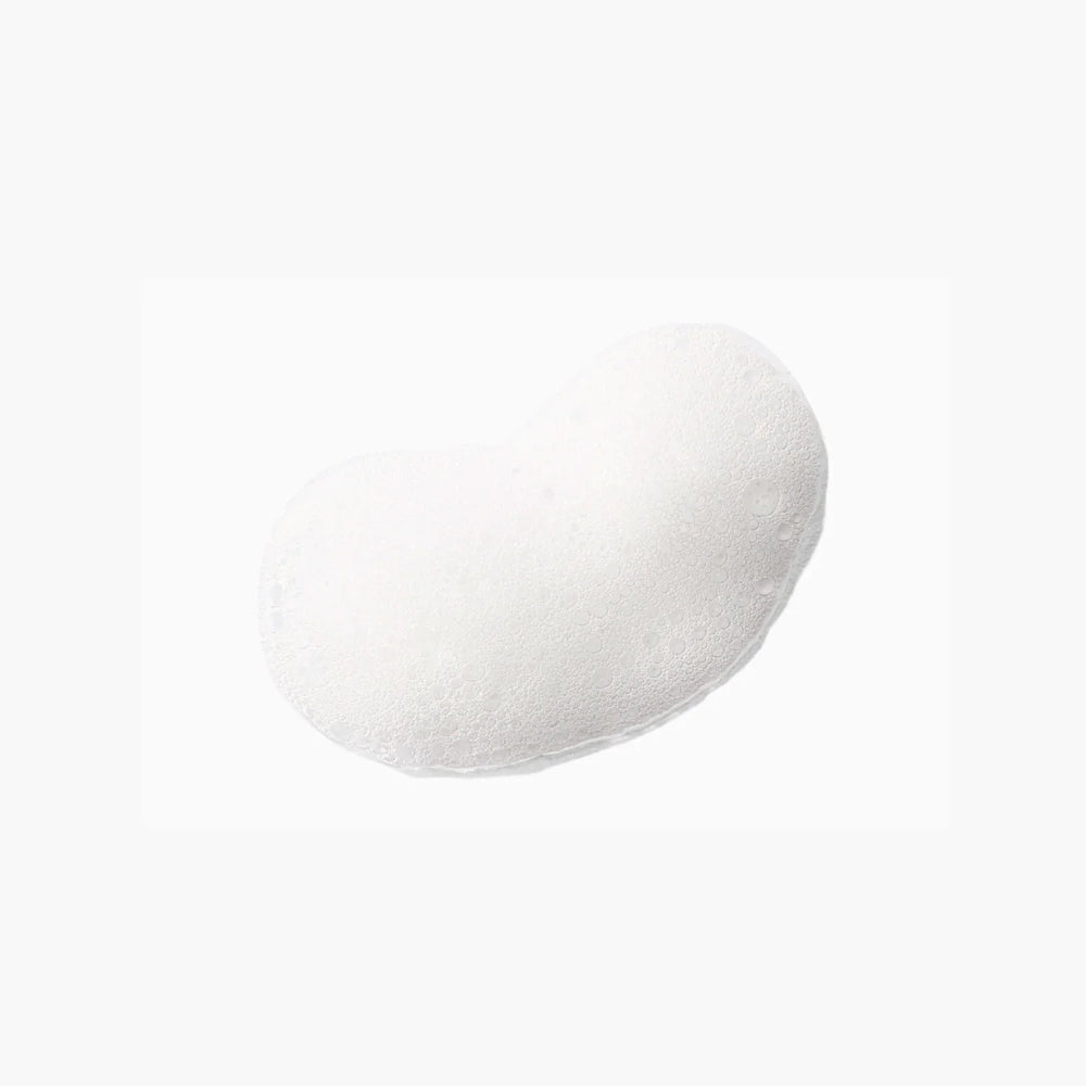 White bottle of Costa Brazil hand and body soap with black pump on a white background