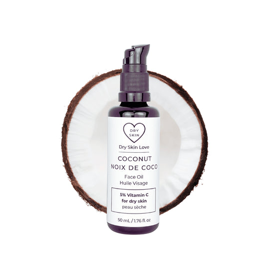 Dry Skin Love Coconut 5% Vitamin C Face Oil for sensitive skin in a 50ml black glass bottle with white label and black pump, featuring organic coconut oil, apple seed oil, and chamomile extract.
