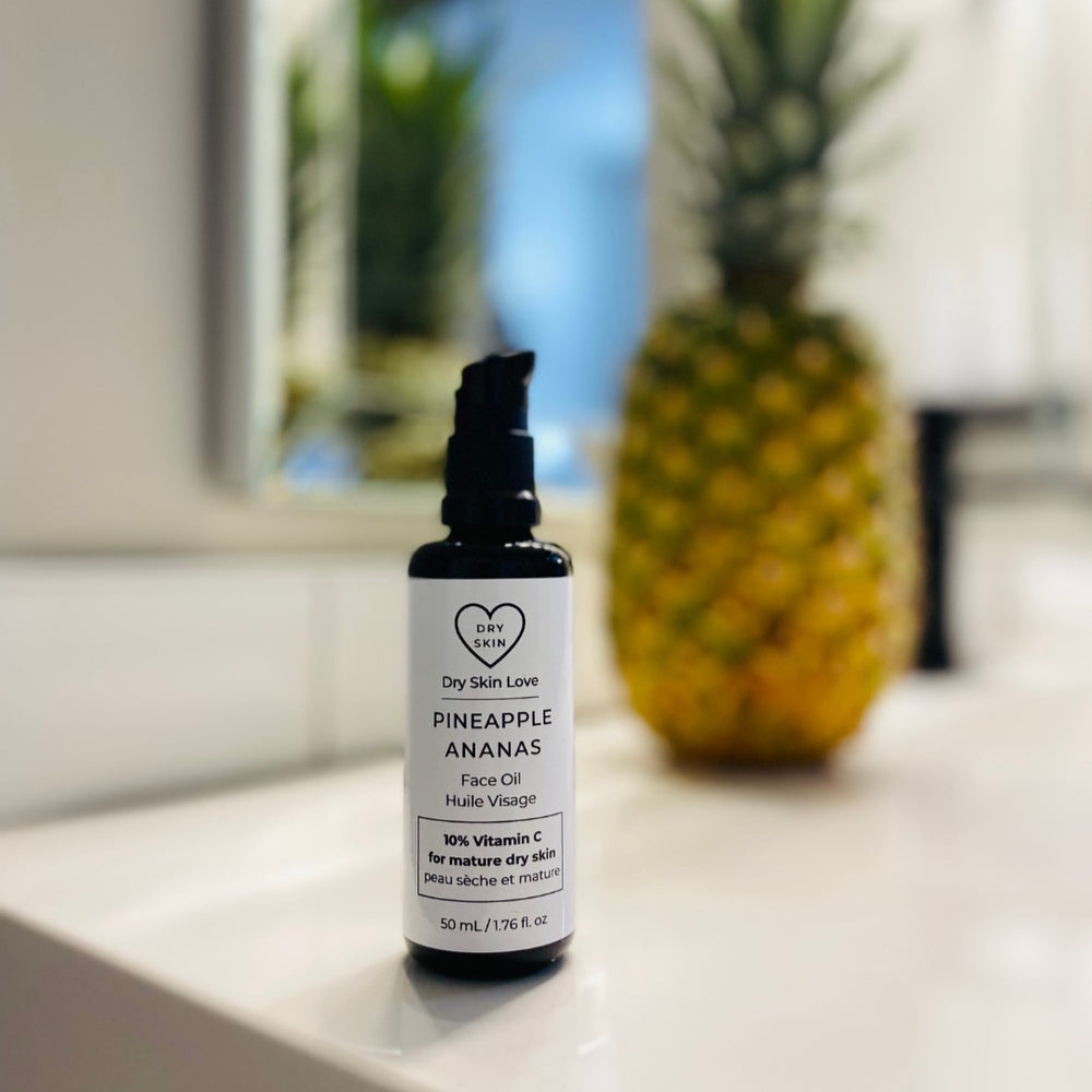 Dry Skin Love Pineapple 10% Vitamin C Face Oil for mature dry skin, featuring cold-pressed pineapple seed oil and gentle vitamin C ester, in 50ml black glass bottle.